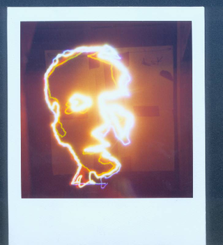 Illustration for article titled Fototron2000 Robot Artist Paints With LEDs, Spits Out Polaroids